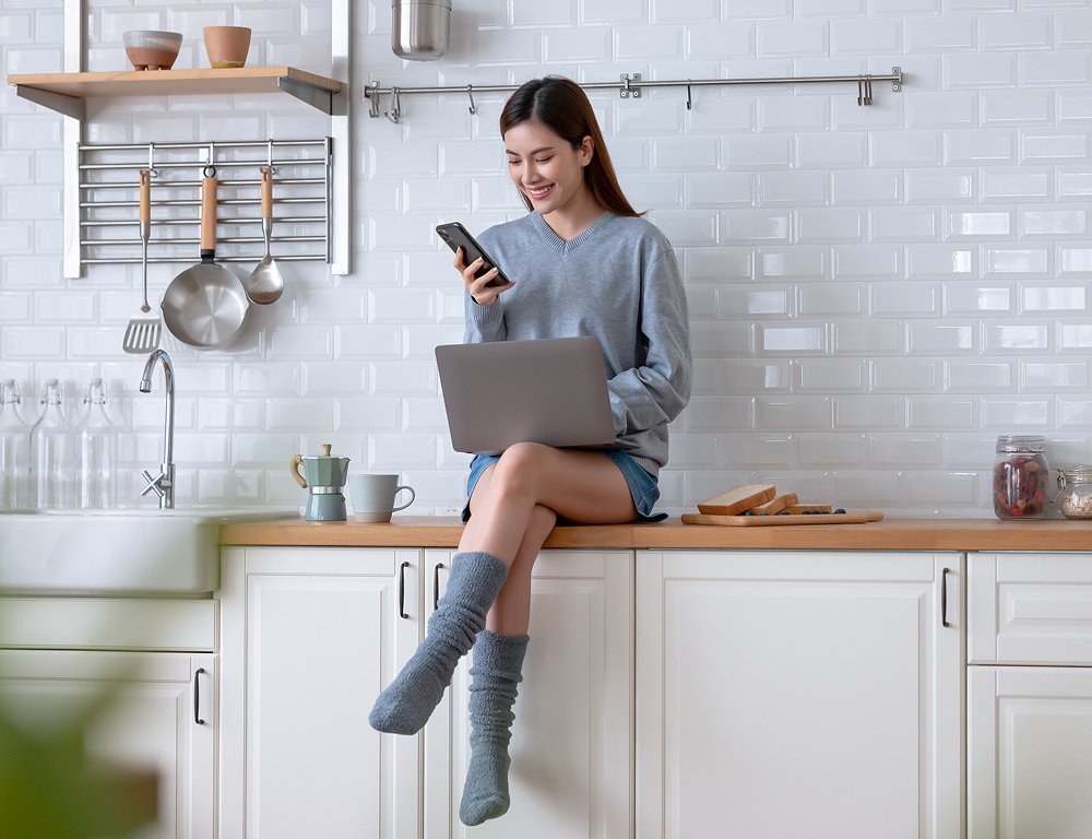 Happy woman in kitchen